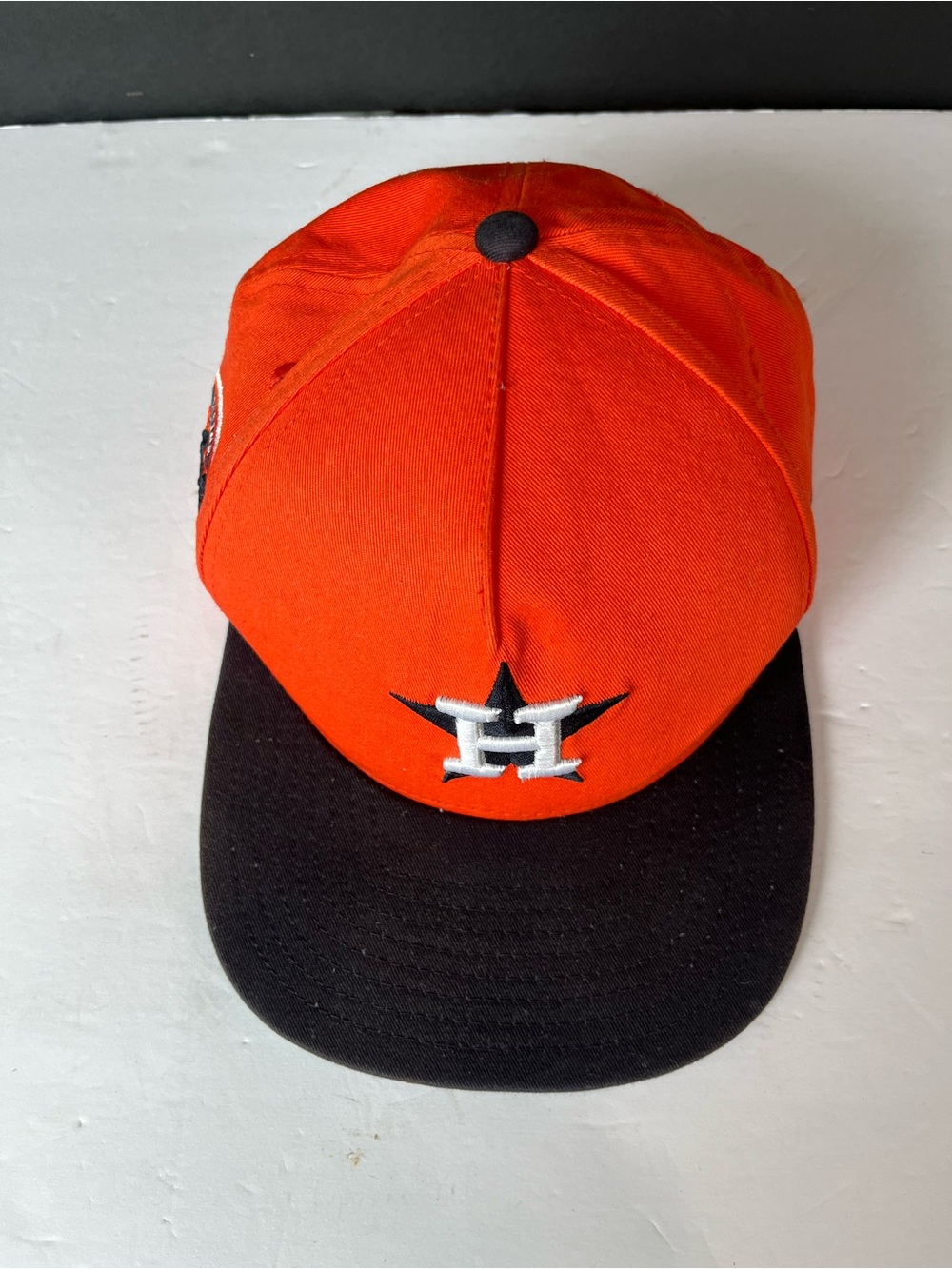 Orange and Black Baseball Cap with Star H Logo